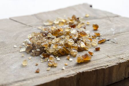 brown cane sugar with silver spoonの写真素材