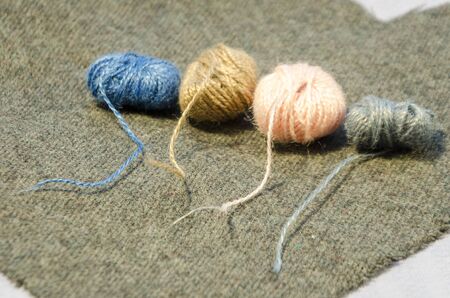 colorful thread in different positions use for sewing