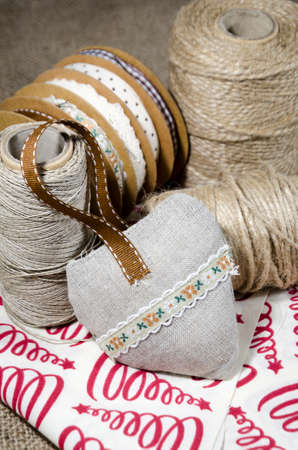 Domestic handmade Christmas decorations heart and stringsの写真素材