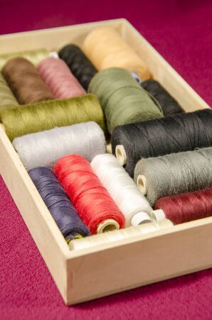 colorful thread in different positions use for sewingの写真素材