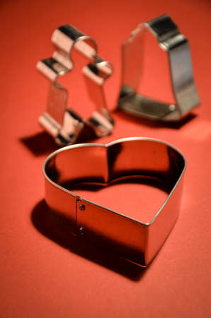 Velentines Card with heart shape on vivid red backgroundの写真素材