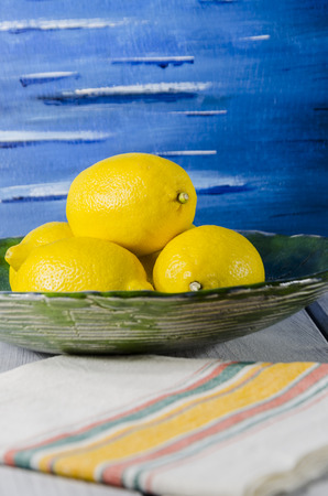 juicy lemon colored golden sunshine on the intense blue colors of the skyの写真素材