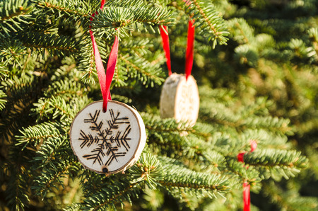 Christmas tree with homemade ornamentsの写真素材