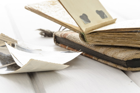 Stack of old photographs with copy spaceの写真素材