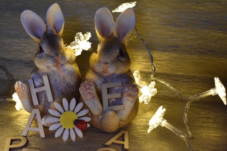 Two Easter eggs, flowers, flowers Flowers and inscription Happy Easter from Wood Lettersの写真素材