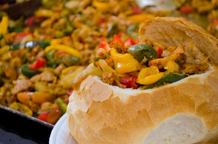 Mixed stew of meat and vegetables  in a bread bowl