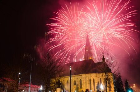 CLUJ - JAN 24: Fireworks for celebrating 157 years from the The United Principalities of Moldavia and Wallachia, also known as the Romanian United Principalities, on the Main Square of Cluj-Napoca, Jan 24, 2016, Romaniaのeditorial素材