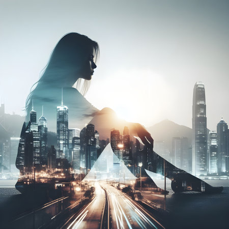Silhouette of businesswoman with double exposure of modern cityscape and road. Toned imageの素材