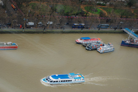 Boats cruising along the River Thames in London, UKのeditorial素材