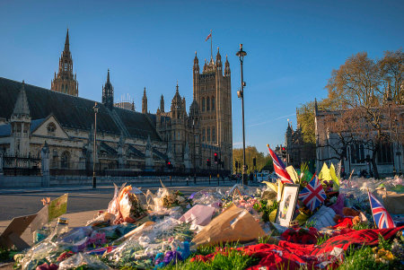 Flowers left on Parliament Square in London following the terrorist attack on Westminster on 22nd March 2017のeditorial素材