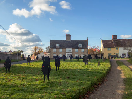 The "Haughley Lads" are wooden silhouettes to remember the men of the village who went to war and never return in Suffolk, UKのeditorial素材