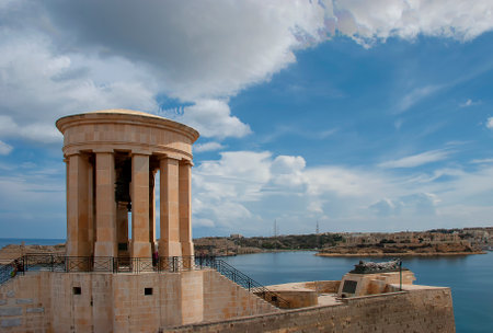 The War Siege Memorial overlooking Valletta Harbour in Maltaの写真素材