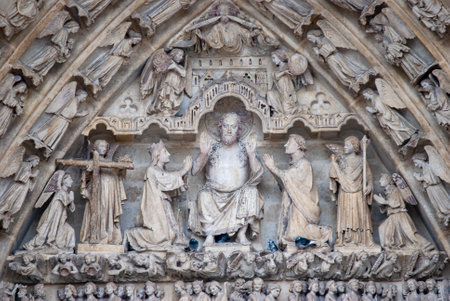 Close up of the detailed carvings on the outside of Amiens Cathedral in Franceのeditorial素材