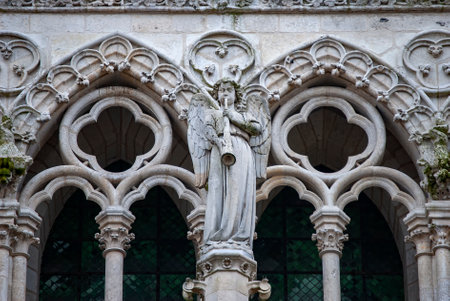 Close up of the detailed carvings on the outside of Amiens Cathedral in Franceのeditorial素材
