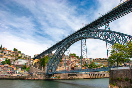 The iconic Dom Luis I arch bridge crossing the Douro River in Porto, Portugal