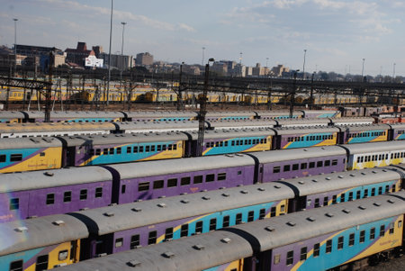 Colourful commuter trains in a siding on Johannesburg, South Africaのeditorial素材