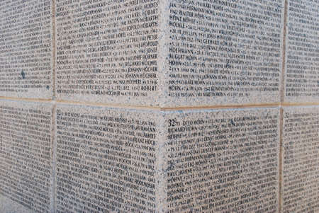 Names of German soldiers killed during the Battle of Stalingrad on a wall at Rossoshka Military Cemetery near Volgograd, Russiaのeditorial素材
