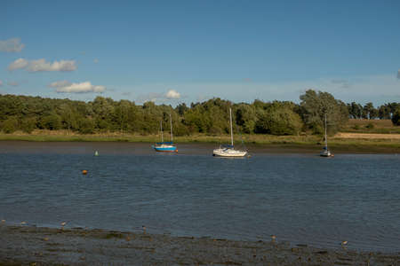 Boats on the River Deben at Woodbridge in Suffolk, UK