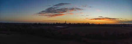 Sunrise over the village of Great Finborough in rural Suffolk, UKの写真素材