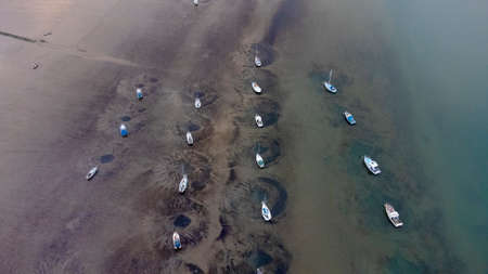 Looking down straight down from a drone on the banks of the River Orwell in Suffolk, UKの写真素材