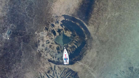 Looking down straight down from a drone on the banks of the River Orwell in Suffolk, UKの写真素材