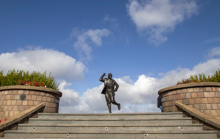 The statue of comedian Eric Morecambe on the promenade in Morecambe, Lancashire, UKのeditorial素材