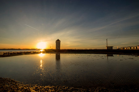Sunset at the River Colne and Brightlingsea Beach in Essex, UKの写真素材