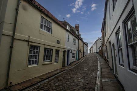 The narrow historic streets of Whitby in North Yorkshire, UKのeditorial素材