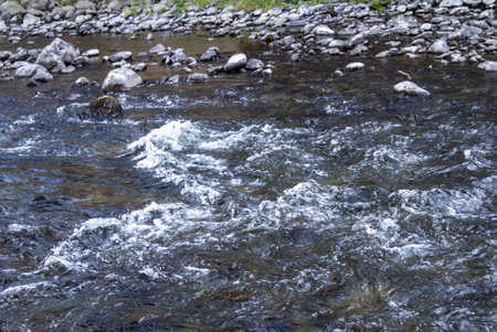 The River Greta flowing through Keswick in Cumbria, UKの写真素材