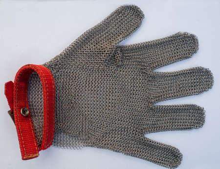 metal protective glove isolated on white background, for butchers or woodworking.
