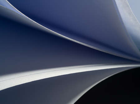 close up abstract with bent paper background, selective focus; blue color.の写真素材