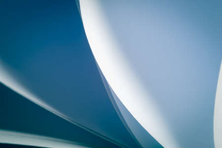 close up abstract with bent paper background, selective focus; blue color.の写真素材