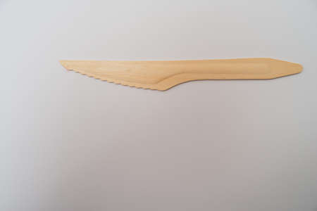 wooden disposable knife, eco freindly cutlery. On white background.