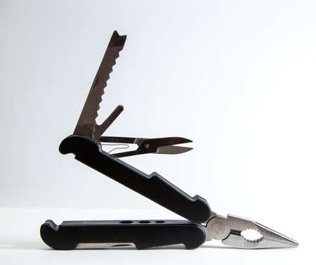 multi purpose tool on white background, camping and survival tools for emergency use