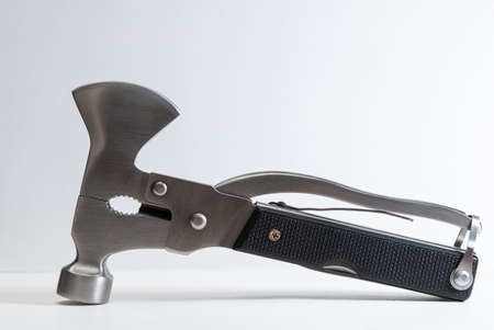 multi purpose tool on white background, camping and survival tools