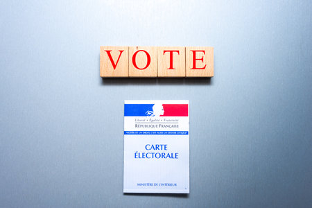 French voting card or carte electorale with wooden blocks and the word vote on themのeditorial素材