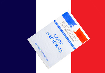 french voting card or carte electorale on top of French flag.のeditorial素材