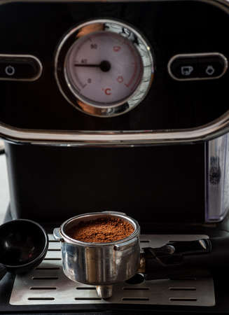 white coffee cup under coffe machine close up.の写真素材