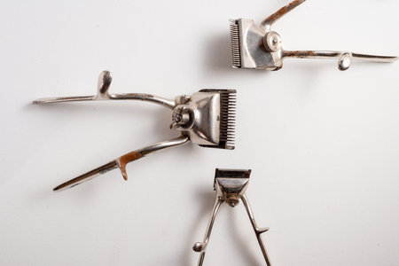 old hair clippers on a white background ,top view , room for text .の写真素材