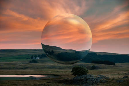 surreal sphere floating in the middle of a beautiful landscape, concept of mental health, living in...