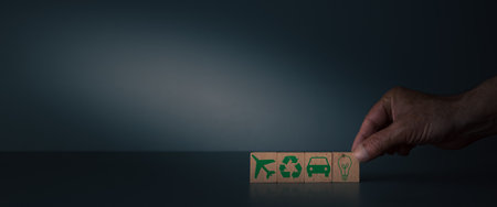 wooden blocks on gray blue background concept of sustainability , energy and conservation .copy...