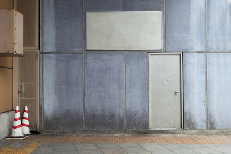 Large blank billboard on a street wall, banners with room to add your own textのeditorial素材