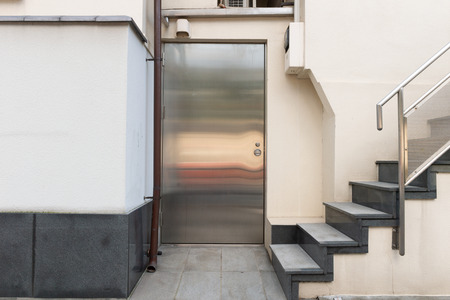 sidewalk by street wall  and  doorのeditorial素材