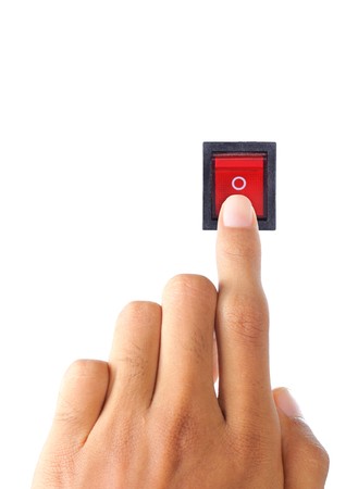 hand pushing electrical swicth