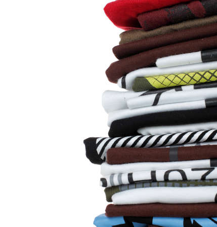 Row of colorful cotton t-shirts over white background