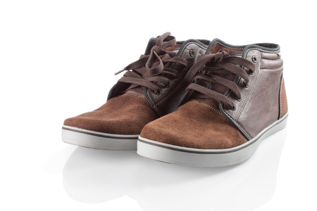 brown sneakers isolated over white backgroundの写真素材