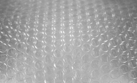 Bubble sheet shot in selective focus with light effectの写真素材