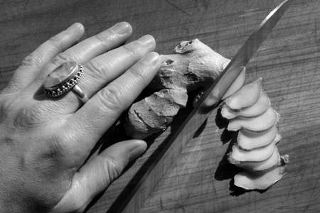 Slicing ginger.の写真素材