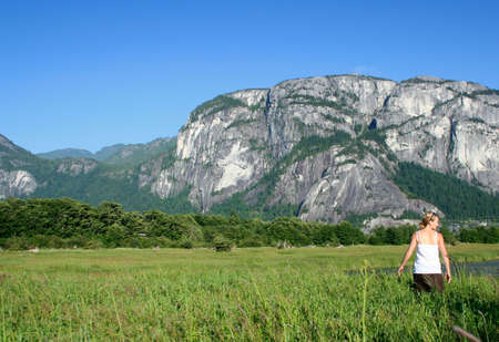 A girl for a walk in the beautiful Squamish estuary.の写真素材