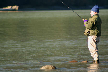 A lone angler hopes for a bite.